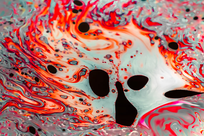The destruction caused by anger conveyed through an abstract soap film photograph
