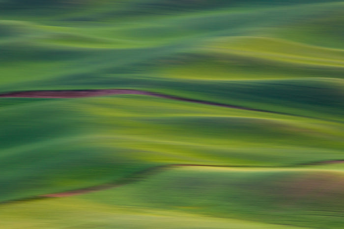Abstract nature photograph of the rolling hills of Palouse created using with Motion Blur